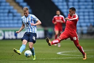 Images Dated 19th March 2016: Coventry City vs Swindon Town: Clash at Ricoh Arena - Andy Rose vs Louis Thompson