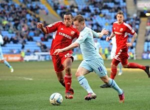 Images Dated 2nd March 2013: Coventry City vs Swindon Town: Npower League One Clash at Ricoh Arena - Intense Rivalry
