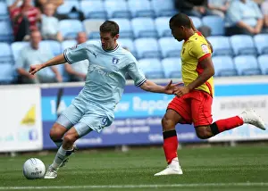 Images Dated 2011 August: Coventry City vs. Watford: Clash between Jutkiewicz and Mariappa in the Npower Championship (20-08-2011)