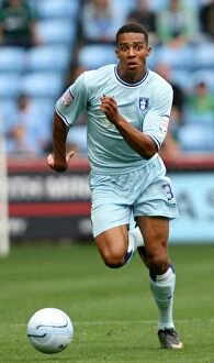 Images Dated 20th August 2011: Coventry City vs. Watford: Cyrus Christie in Action at the Ricoh Arena (Npower Championship)