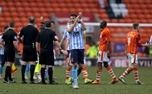 Images Dated 12th March 2016: Coventry City's Aaron Martin Celebrates League One Victory with Fans at Blackpool