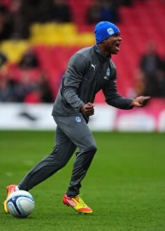 17-03-2012 v Watford, Vicarage Road Collection: Coventry City's Alex Nimely: Uncontainable Excitement During Warm-Up Ahead of Watford Clash
