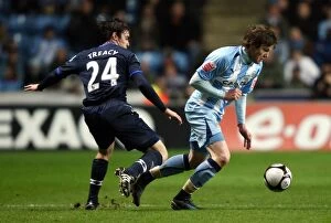 Images Dated 24th February 2009: Coventry City's Aron Gunnarsson Outmuscles Keith Treacy in FA Cup Showdown (Fifth Round Replay)
