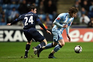 Images Dated 2009: Coventry City's Aron Gunnarsson Outmuscles Keith Treacy in FA Cup Showdown (Fifth Round Replay)