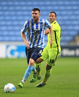 Football Full Length Prints: Coventry Citys Chris Stokes (left) and Southend Uniteds Noel Hunt battle for the ball
