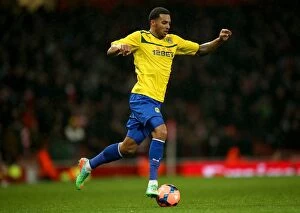 Images Dated 24th January 2014: Coventry City's Cyrus Christie Takes on Arsenal at Emirates Stadium in FA Cup Round 4 (2014)