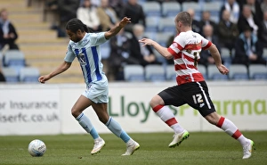 Images Dated 2015 March: Coventry Citys Dominic Samuel scores the opening goal against Doncaster Rovers