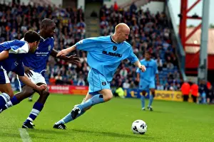 Prints of Coventry Citys Lee Hughes holds off Stockports Ali Gibb and Leo Roget Nationwide League Division One Prints: Coventry City's Lee Hughes: Fending Off Stockport Defenders Amidst Division One Momentum (11-08-2001)