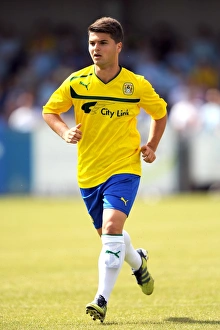 Images Dated 2012 July: Coventry City's Ndriqim Halili in Action: A Pre-Season Thriller at Nuneaton Town's Liberty Way Stadium