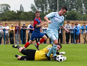 Coventry City's Roy O'Donovan Outsmarts Hinckley United's Goalkeeper during Pre-Season Friendly