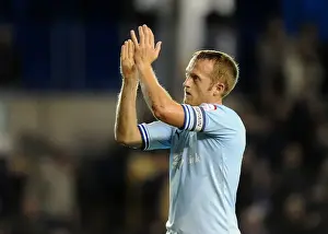 Images Dated 1st November 2011: Coventry City's Sammy Clingan Celebrates Millwall Victory with a Fan Salute (01-11-2011)