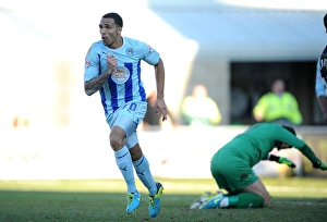 Images Dated 2014 March: Coventry City's Wilson Doubles Up as Neal Expresses Frustration