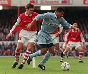 Legends Collection: Coventrys John Salako holds off Adrian Clark during Premiership match at Highbury