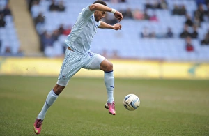Images Dated 2013 March: Cyrus Christie in Action: Coventry City vs Doncaster Rovers