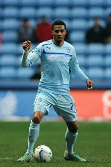 Images Dated 2013 January: Cyrus Christie in Action: Coventry City vs Oldham (Npower League One) - Ricoh Arena