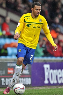 Images Dated 2013 March: Cyrus Christie at Glanford Park: Coventry City in Football League One Clash with Scunthorpe United (March 9)