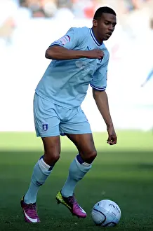 Images Dated 2011 October: Cyrus Christie vs Burnley: Npower Championship Showdown at Ricoh Arena (22-10-2011)