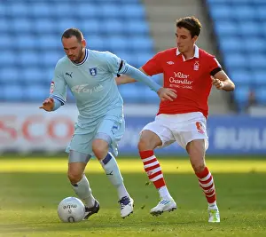 Images Dated 15th October 2011: David Bell vs. Matt Derbyshire: A Championship Showdown at Ricoh Arena