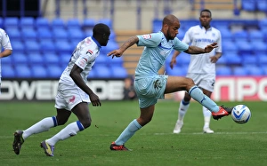 Tranmere Rovers V Coventry City : Prenton Park : 15-09-2012 Prints: David McGoldrick vs Zoumana Bakayogo: Intense Face-Off in Coventry City's Npower League One Clash at Prenton Park