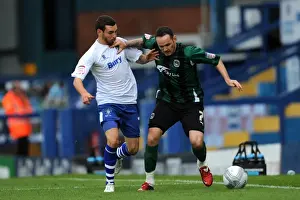 David Worrall vs. David Bell: Intense Battle for the Carling Cup Ball at Gigg Lane - Bury vs. Coventry City