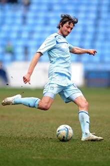 Images Dated 29th March 2013: Determined Adam Barton in Coventry City's Npower League One Battle against Doncaster Rovers at