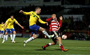 Determined Gary McSheefrey Fires A Shot Amidst Doncaster's Intense Pressure in Coventry City's Npower League One Clash