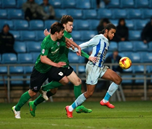 Images Dated 2015 February: Dominic Samuel vs Niall Canavan: A Battle in Sky Bet League One - Coventry City vs Scunthorpe United