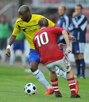 Images Dated 31st July 2012: Edjenguele Overpowers Ormerod: Coventry City's Pre-Season Battle at Wrexham's Racecourse Ground