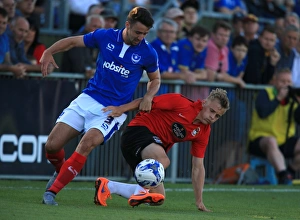 Images Dated 2015 July: Enda Stevens vs George Thomas: A Battle for Possession in Portsmouth vs Coventry City Pre-Season Friendly
