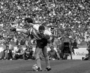 Images Dated 16th May 1987: FA Cup Final: Trevor Peake of Coventry City Carries Off Clive Allen of Tottenham Hotspur at Wembley