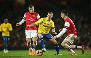 FA Cup : Round 4 : Arsenal v Coventry City : Emirates Stadium : 24-01-2014 Collection: FA Cup Fourth Round Showdown: Wilshere and Koscielny vs. Baker - Arsenal vs. Coventry City