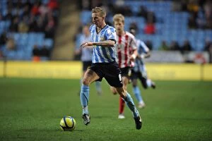 Images Dated 7th January 2012: FA Cup Third Round Showdown: Coventry City vs Southampton - Carl Baker's Epic Battle at Ricoh Arena