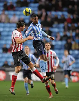 Images Dated 7th January 2012: FA Cup Third Round Showdown: Shaun Jeffers vs Aaron Martin - Coventry City vs Southampton (07-01-2012)