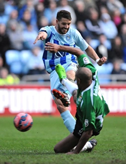 Images Dated 2014 November: FA Cup Showdown: Coventry City vs Worcester City - Aaron Martin's Thrilling Shot at Ricoh Arena