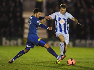 Images Dated 2013 November: FA Cup Showdown: Francomb vs. Baker Clash at The Cherry Red Records Stadium - AFC Wimbledon vs