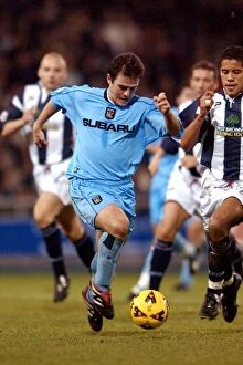 Images Dated 12th December 2001: A Fierce Face-Off: David Thompson vs. West Bromwich Albion - Coventry City's Intense Division One