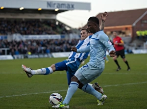 Images Dated 2012 November: Football League One Rivalry: Battle for the Ball - Hartlepool United vs