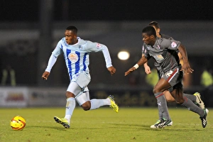Images Dated 2013 November: Franck Moussa Evas Kieran Agard: A Moment of Skill in Coventry City vs Rotherham United (Sky Bet League One)