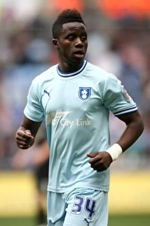 Images Dated 7th April 2012: Gael Bigirimana in Action: Coventry City vs. Peterborough United (07-04-2012, Ricoh Arena)