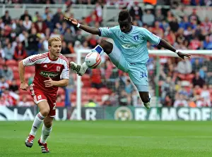 27-08-2011 V Middlesbrough, Riverside Prints: Gael Bigirimana Soars High: Coventry City vs Middlesbrough in Championship Action