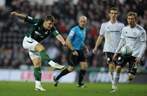 Images Dated 14th January 2012: Gary Deegan's Determined Shot at Pride Park: Coventry City vs