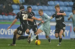 Images Dated 2012: Gary McSheffrey Attempts to Breach Ipswich's Defense in Coventry City's Championship Clash