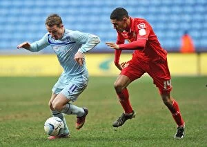 Images Dated 23rd February 2013: Gary McSheffrey Beats Kelvin Mellor: Coventry City vs Crewe Alexandra, Npower League One
