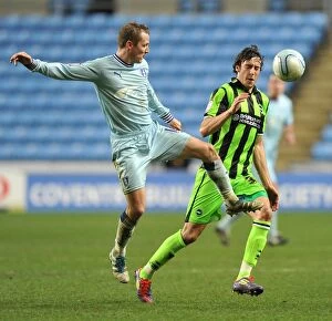 Images Dated 31st December 2011: Gary McSheffrey Outpowers Will Buckley: Coventry City vs Brighton & Hove Albion