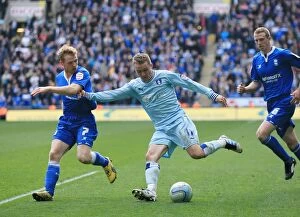 Images Dated 10th March 2012: Gary McSheffrey vs. Birmingham City Defenders: A Fierce Clash During Coventry City's Npower