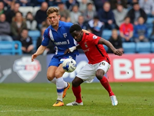 Soccer Football Birmpics Prints: Gillingham vs Coventry City: Intense Battle for Possession - George Williams vs Gael Bigirimana