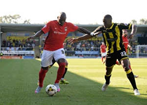 Intense Battle: Binnom-Williams vs. Fortune - Sky Bet League One Tackle Showdown between Burton Albion and Coventry City