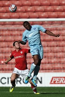 Images Dated 1st October 2011: Intense Battle for Control: Npower Championship Showdown - Coventry City vs Barnsley