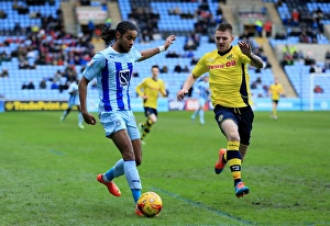 Intense Battle for Possession: Dominic Samuel vs Ashley Eastham in Coventry City vs Rochdale (Sky Bet League One)
