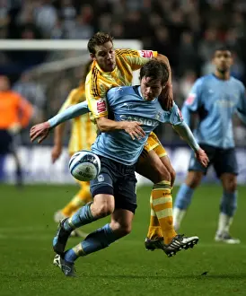 Images Dated 2009 December: Intense Battle for Possession: Coventry City vs Newcastle United (Championship Clash at Ricoh Arena)